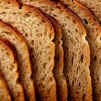 Fresh homebaked artisan sourdough bread. Texture of sliced loaf of bread close up. Bread background. photo