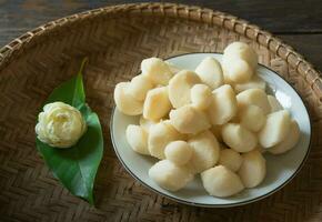 a bowl of Traditional Thai desserts made from rice flour on a table photo