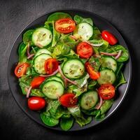 Healthy green salad with fresh tomato, cucumber, red onion and lettuce in bowl on dark stone background. Top view. generative ai. photo
