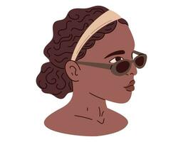 Female head of an African American woman wearing sunglasses. Vector flat portrait of a young beautiful girl.