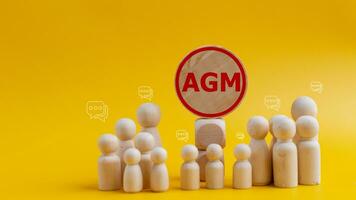 conceptual imagen de un grupo de personas con el palabra agm. negocio concepto. agm anual general reunión foto