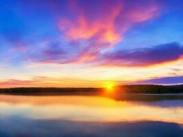 Panorama of beautiful sunrise over lake photo