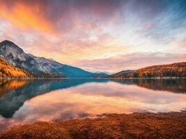 Fantastic autumn sunset of Hintersee lake photo