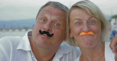 Funny senior couple with moustache video