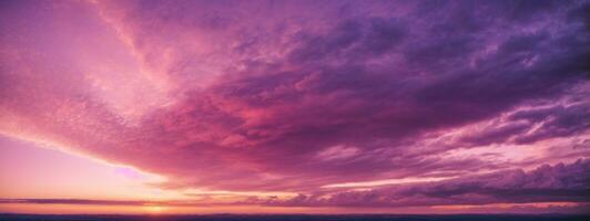 Panoramic view of a pink and purple sky at sunset. Sky panorama background.. AI generated photo