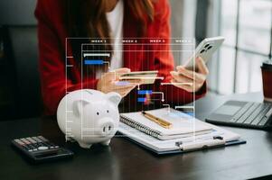 Project manager working and update tasks with milestones progress planning and Gantt chart scheduling diagram. business working with smart phone, tablet and laptop in office. photo