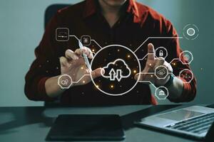 Woman use Laptop computer and tablet with cloud computing diagram show on hand. Cloud technology. Data storage. Networking and internet service concept. with virtual icon photo