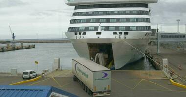 Trucks Boarding the Ferry in Harbor of Tallinn video