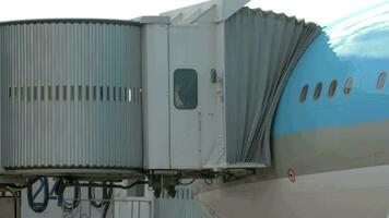 People Leaving the Plane Through Jet Bridge video