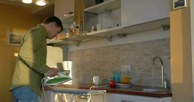 Man Ironing with Steam video