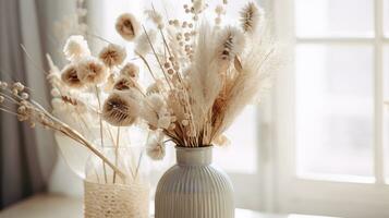 Beautiful and delicate bouquet of dried flowers in interior. Scandinavian style photo