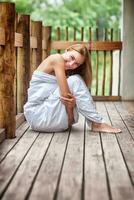 Gentle woman on the terrace photo