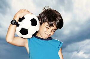 Football player celebrating victory photo