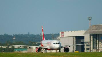 DUSSELDORF, GERMANY JULY 21, 2017 - Airberlin Airbus 320 D ABZI taxiing to the start at sunset. Dusseldorf airport video