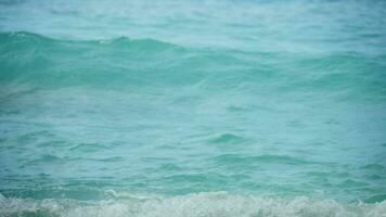 Turquoise waves rolled on the beach coral sand, Koh Miang Island, Similan, slow motion Best use for relaxing video