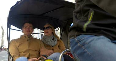 Tourists Riding Cycle Rickshaw in Tallinn video