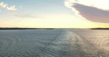 Man using pad to make scenic photos from the ship video