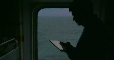 Man using touch pad during the cruise video