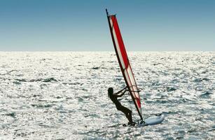 Windsurfer girl at play photo