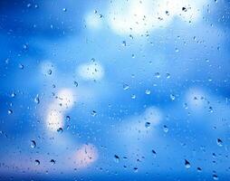 Window glass with raindrops photo