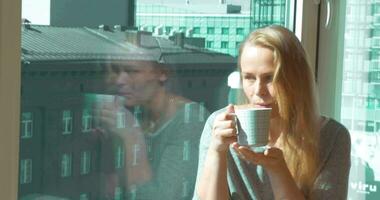 Woman Drinking Morning Tea by Window video