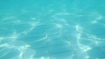 Pool floor with waving shiny water video