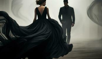 A couple are dressed in expensive designer gowns, in the style of dark tonality photo