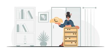 A woman is standing next to a stack of boxes vector