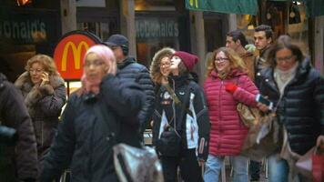 People passing by McDonald's restaurant video