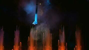 Aerial performance on the stage with fountains video