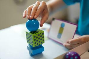 developing motor skills and thinking toys for small children photo
