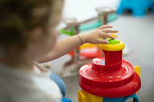 developing motor skills and thinking toys for small children photo