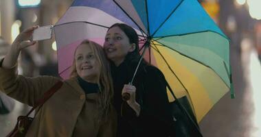 Two girls makes selfie on rainy day video