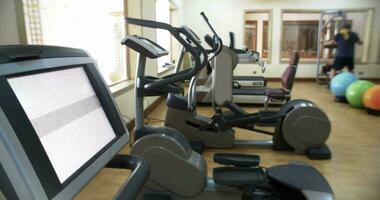 Fitness center with exercise machines video