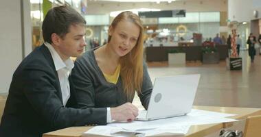 Man and Woman Discussing New Business video