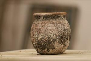 Damaged earthen pot photo