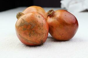 pomegranate in the white background photo