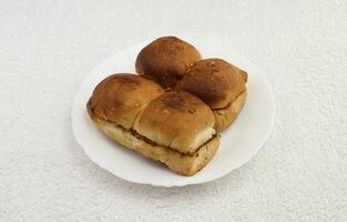 pav in white plate and white background photo
