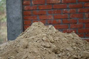 The soil is yellow at the place where the house is being built. photo