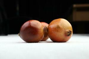 pomegranate in the dark background photo