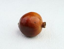 pomegranate in the white background photo