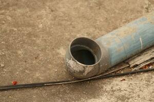 plastic pipe in the corner of the ceiling photo