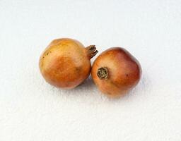 pomegranate in the white background photo