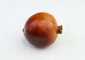 pomegranate in the white background photo