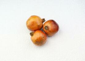 pomegranate in the white background photo