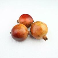 pomegranate in the white background photo