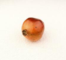 pomegranate in the white background photo