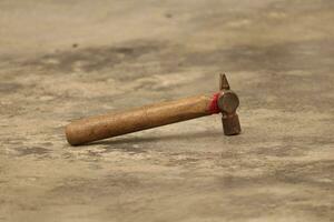 A hammer on the floor photo