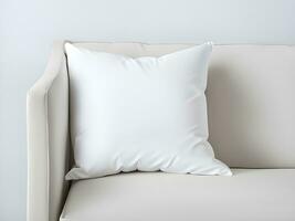 modern white pillows on sofa photo