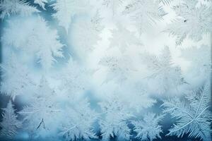 Elaborate frost patterns on winter windowpanes background with empty space for text photo